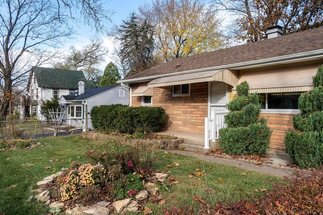 view of property exterior featuring a yard