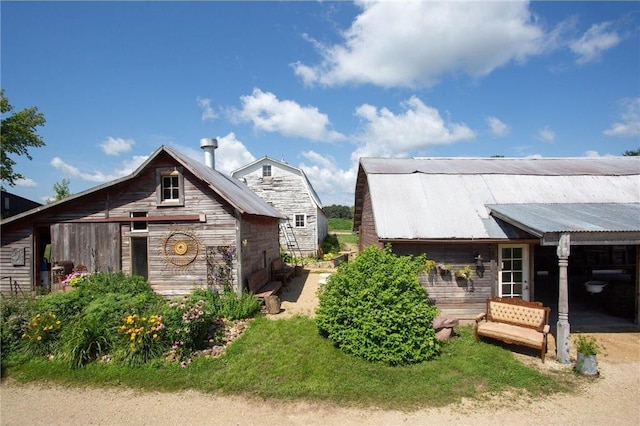 exterior space with an outbuilding