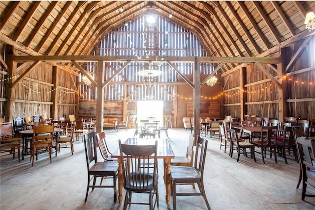 dining area with high vaulted ceiling, wood ceiling, and beamed ceiling