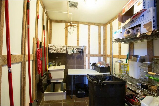 storage room featuring sink