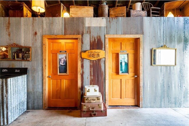 interior space featuring wooden walls