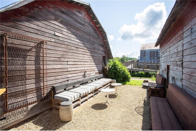 view of property exterior with a patio