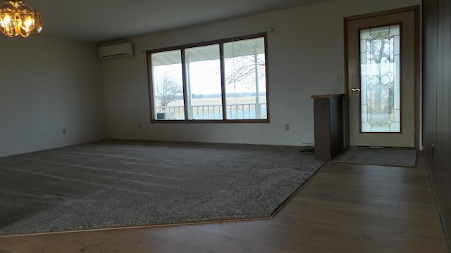 entrance foyer with an AC wall unit