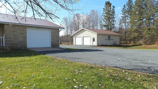 garage with a yard