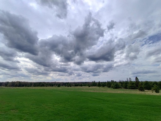 exterior space with a rural view