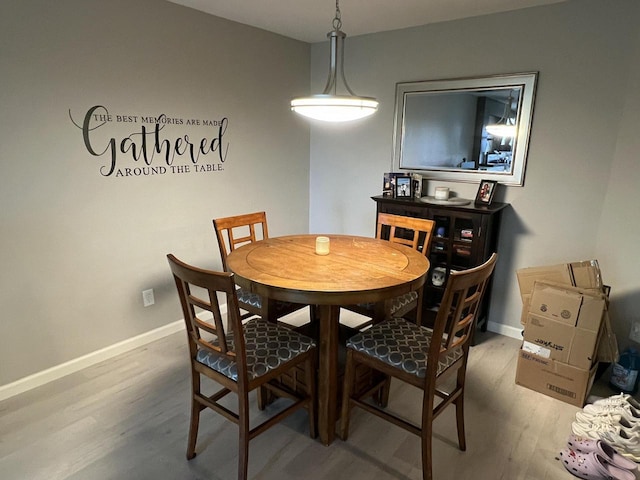 dining room with hardwood / wood-style floors