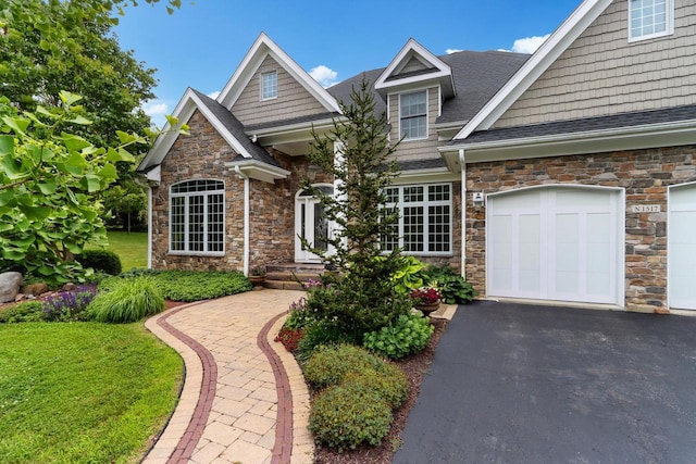 craftsman-style home with a garage