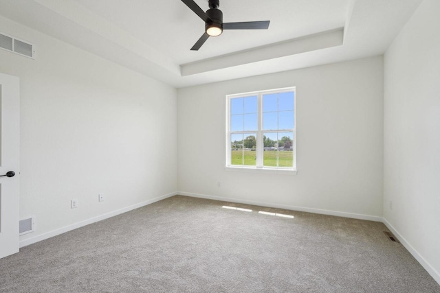 502 Hickory Hollow Rd Unit 0101, Waterford, WI 53185 - carpeted spare room featuring baseboards and ceiling fan