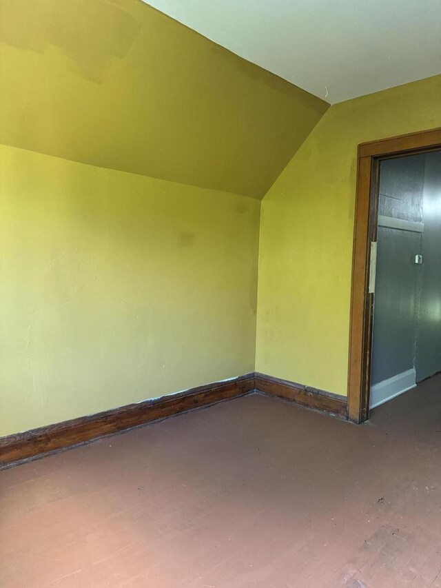 bonus room with vaulted ceiling