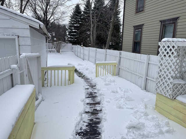 view of yard layered in snow