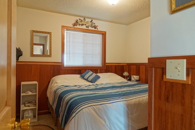 bedroom featuring a textured ceiling