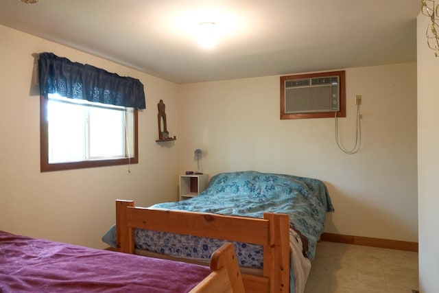 bedroom with a wall unit AC