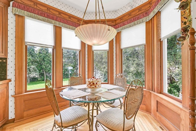 sunroom / solarium featuring a wealth of natural light