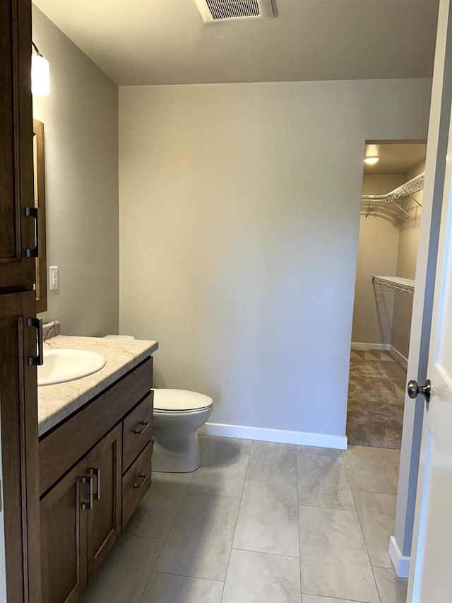 N9248 Constellation Dr, Appleton, WI 54915 - bathroom with vanity and a walk in closet