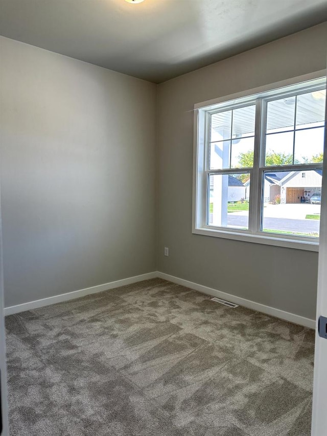 empty room featuring carpet