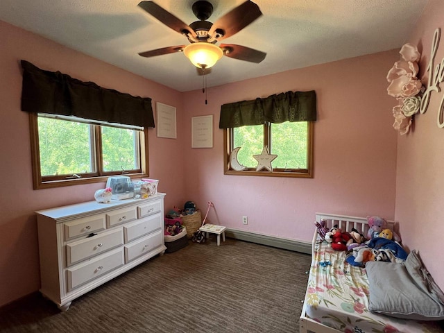 bedroom with multiple windows and ceiling fan