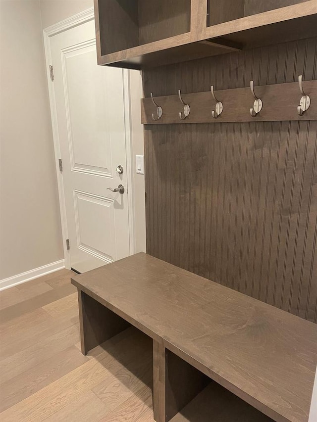 mudroom with light hardwood / wood-style flooring