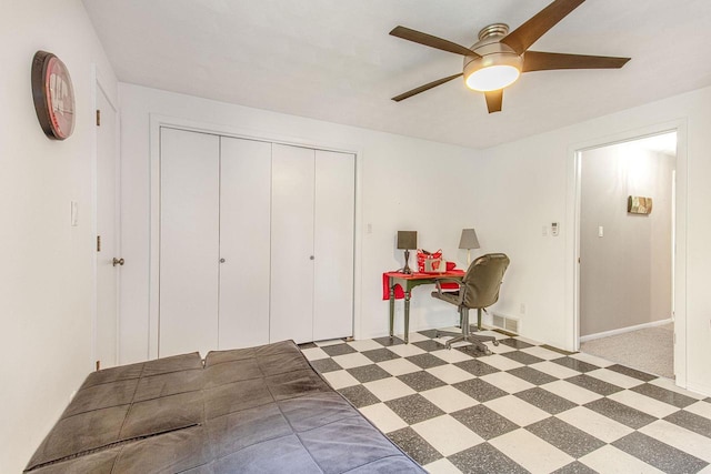 interior space featuring ceiling fan