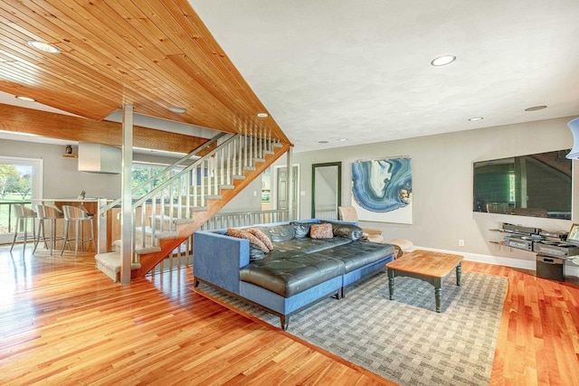 living room featuring wooden ceiling and hardwood / wood-style floors