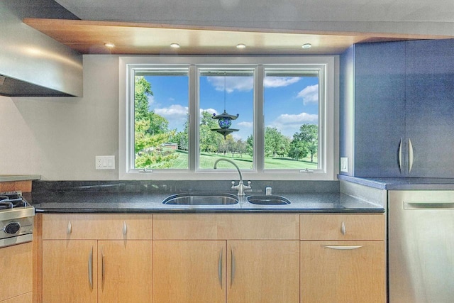 kitchen featuring dishwasher, gas cooktop, sink, light brown cabinets, and ventilation hood