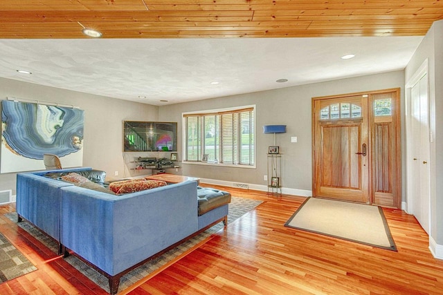 living room featuring wood ceiling and light wood-type flooring