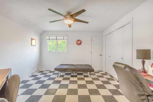 unfurnished bedroom with lofted ceiling, ceiling fan, and a closet