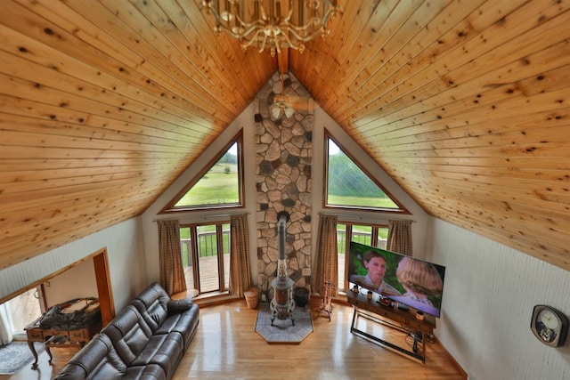 interior space with high vaulted ceiling, wood ceiling, a chandelier, and light hardwood / wood-style floors