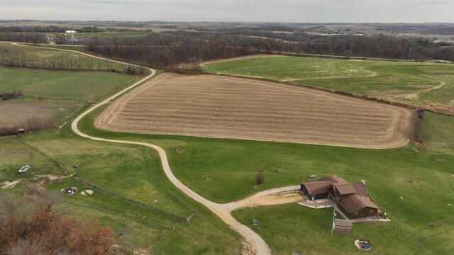 birds eye view of property featuring a rural view