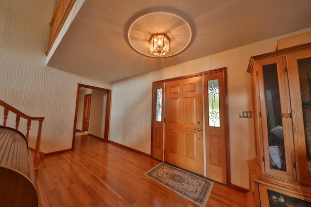 entrance foyer featuring light wood-type flooring