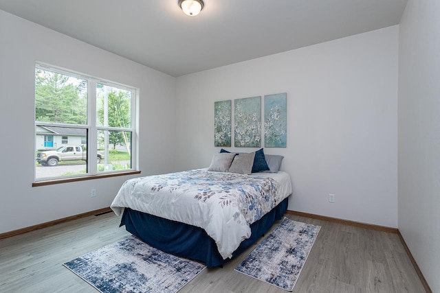 bedroom featuring light hardwood / wood-style floors