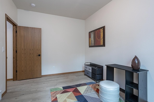 bedroom featuring light wood-type flooring