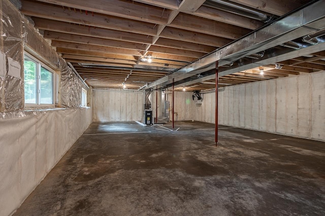 basement featuring heating unit