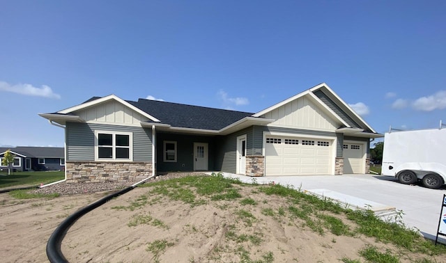 craftsman house with a garage