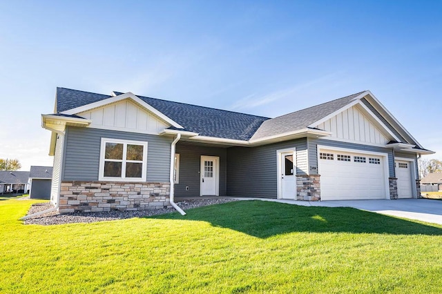 view of front facade with a garage and a front yard