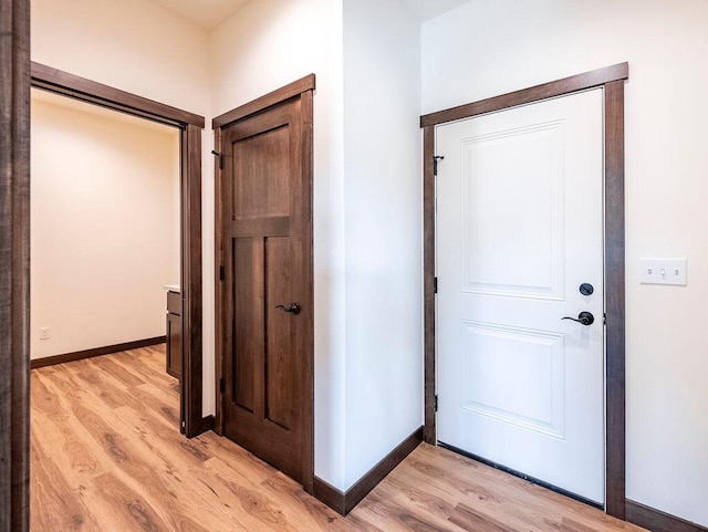 foyer with light wood-type flooring