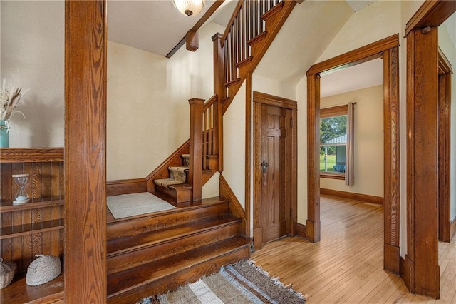 stairway featuring hardwood / wood-style flooring