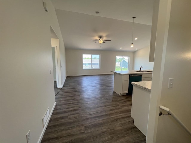 kitchen featuring white cabinetry, dishwasher, ceiling fan, dark hardwood / wood-style floors, and sink