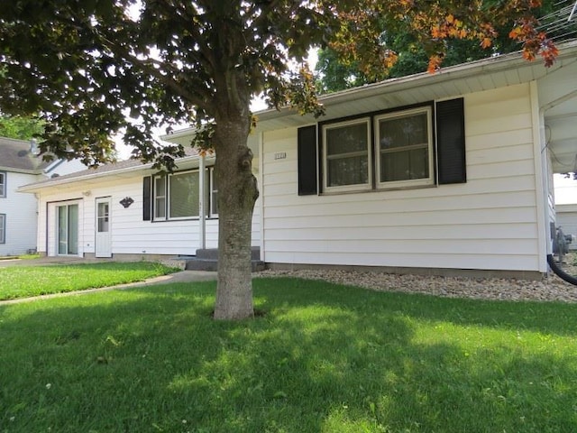 view of front of home with a front yard