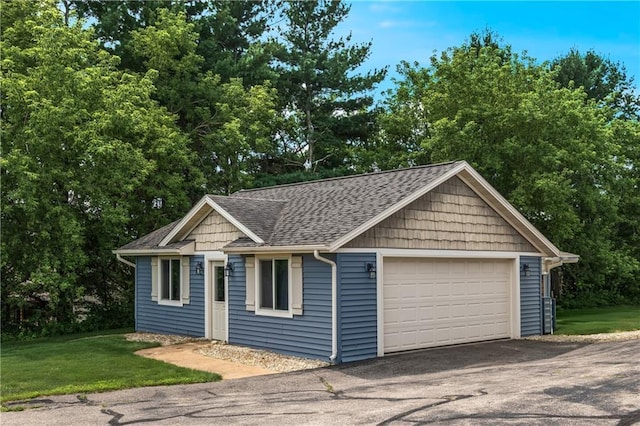 garage with a lawn