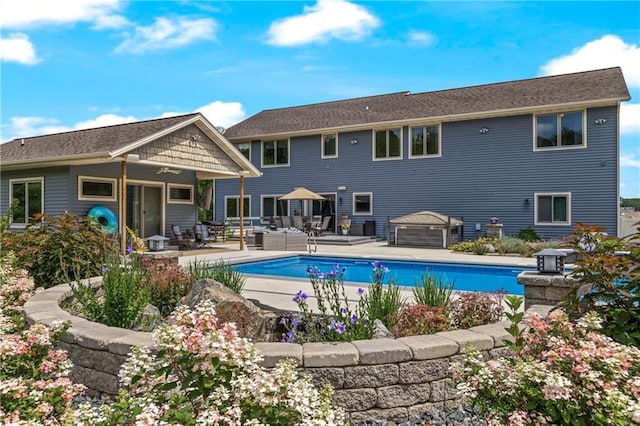 view of pool featuring a patio