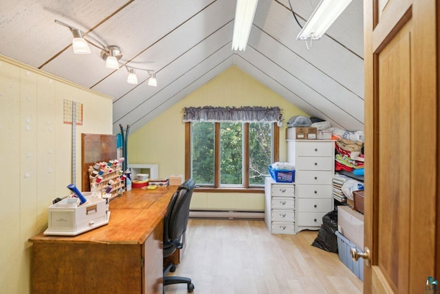 home office with lofted ceiling, a baseboard heating unit, light hardwood / wood-style floors, and wood walls