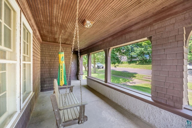 interior space featuring wooden ceiling