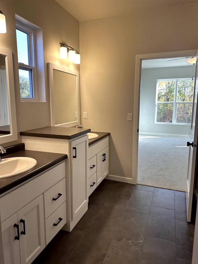 bathroom with vanity and ceiling fan