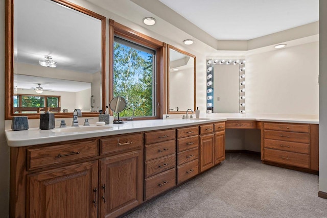 bathroom with vanity and ceiling fan