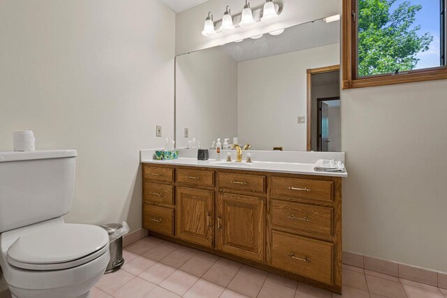 full bathroom with vanity, toilet, and separate shower and tub