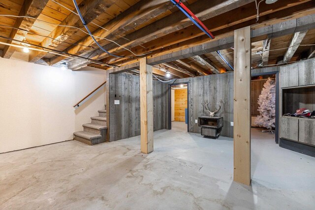 basement featuring a wood stove