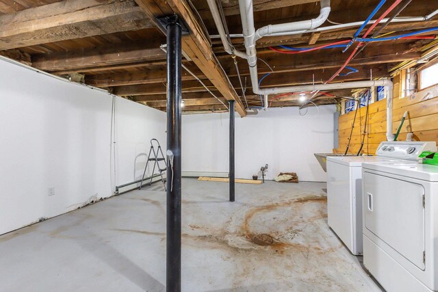 basement with washing machine and dryer