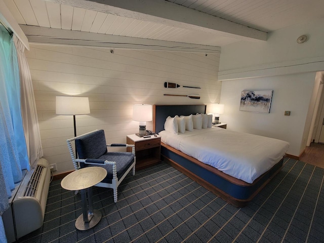 bedroom featuring beam ceiling