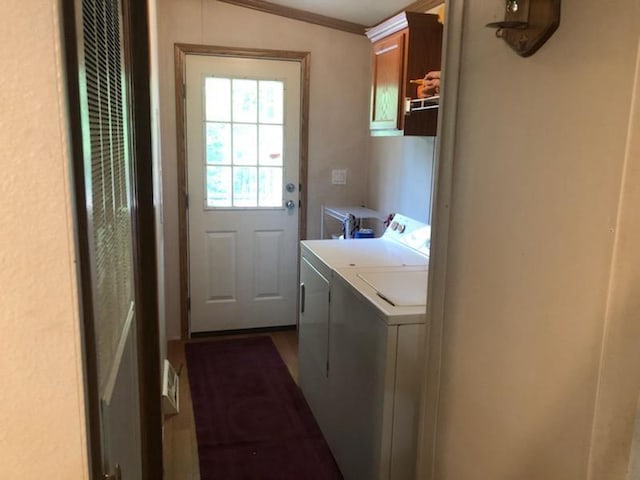 laundry area with cabinets and washer and dryer