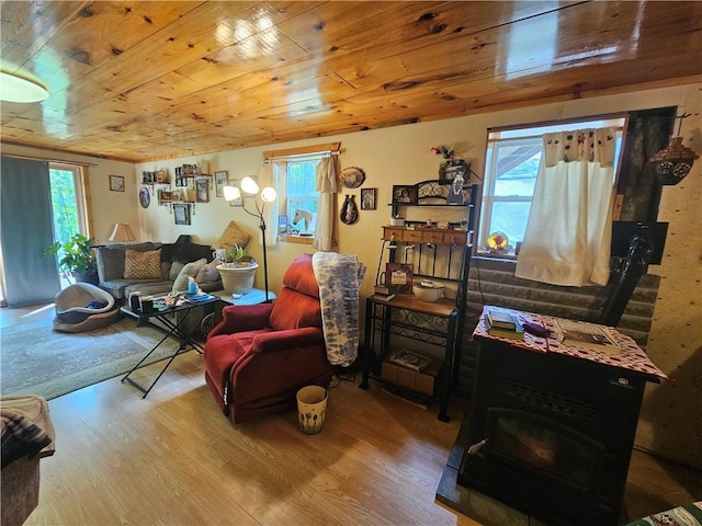 sitting room with wood ceiling and light hardwood / wood-style flooring